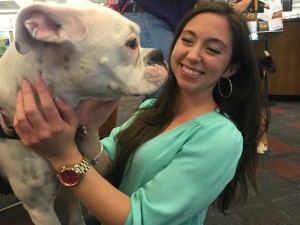 Krista Iuliucci lets Daisy know she is appreciated at the pet therapy Fall 2015 Stressbusters event at Kilmer Library. 