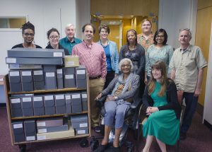 2016 Jazz Archives Fellows and Institute of Jazz Studies and Dana Library faculty and staff pose with Joanne Robinson Hill and the processed Andrew Hill collection.  Pictured (L-R) Angela Lawrence, Adriana Cuervo, Bob Nahory, Brad San Martin, Krista White, Joanne Robinson Hill, Veronica Johnson, Max Dienemann, Treshani Perera, Elizabeth Surles, and Tad Hershorn.  Photo by Ed Berger, some rights reserved.