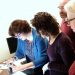 Staff examines microfilm