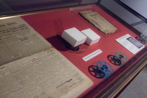 A case display illustrated the source material for the digital copies of newspapers now available online.