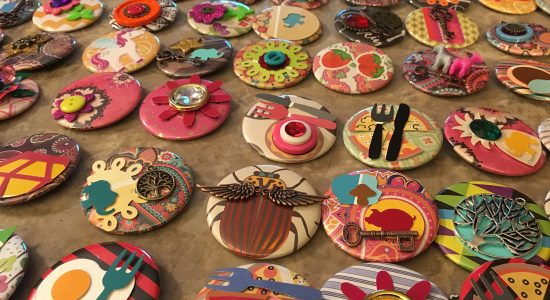 A sampling of the one-of-a-kind buttons that lucky patrons got to take home with them from Megan Lotts's Take Away project.