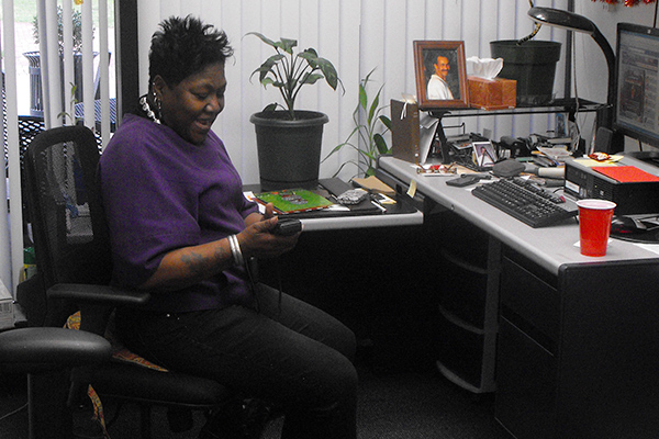 Maggie Harris-Clark in her Dana Library office, ca. 1980s