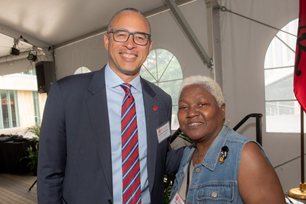 Maggie Harris-Clark with Rutgers President Jonathan Holloway
