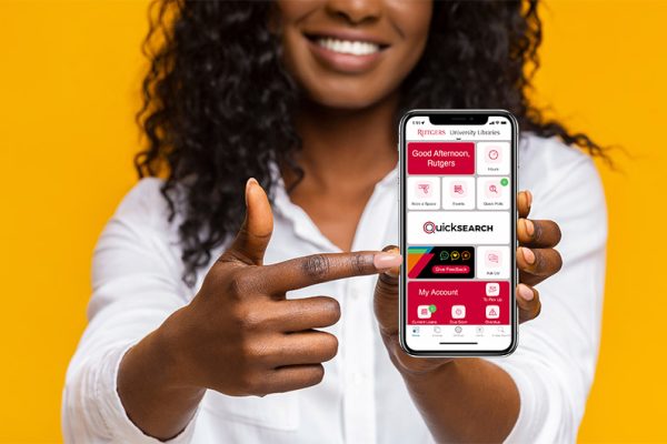 Student showcases Library Mobile on her smartphone.