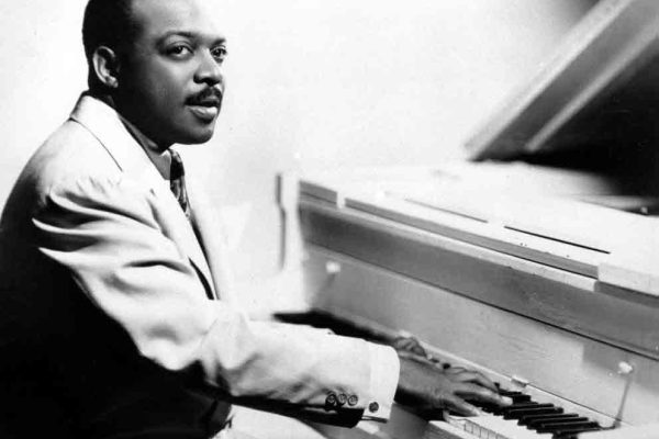 Count Basie at the piano.