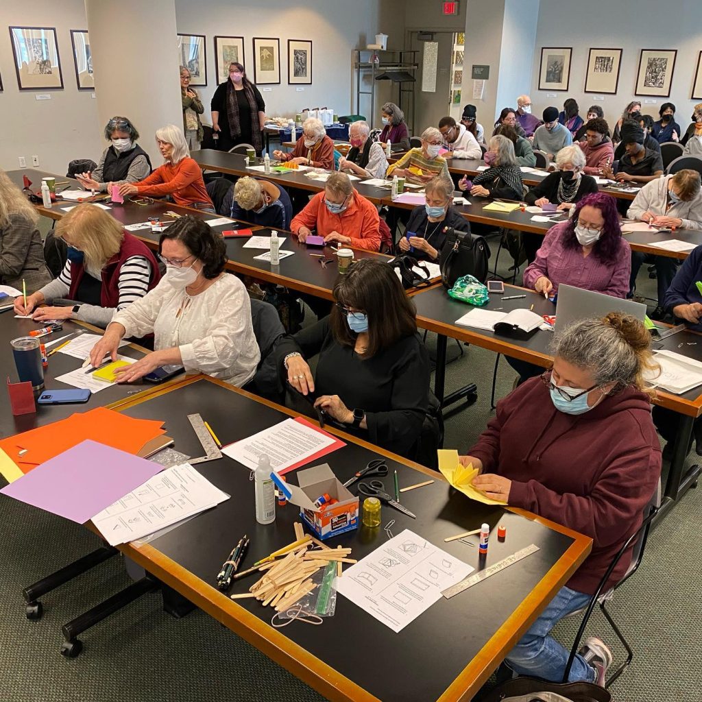 Triangle book making workshop at the 28th Annual New Jersey Book Arts Symposium.