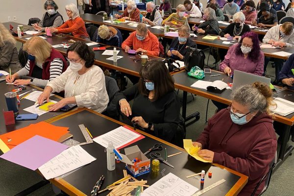 Triangle book making workshop at the 28th Annual New Jersey Book Arts Symposium.