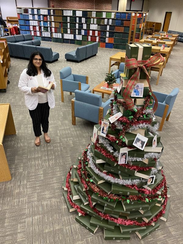 RWJ Library holiday book billboard and display.