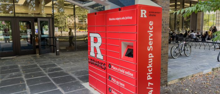 Bright red locker shown outside a building