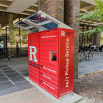 A bright red locker shown outside a building