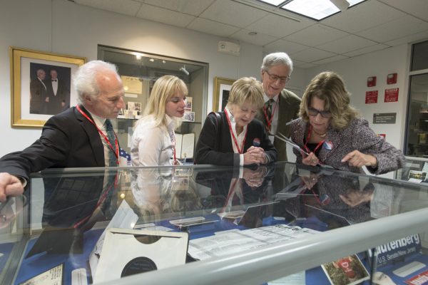 Attendees view the Senator Frank Lautenberg Papers exhibit prior to the event