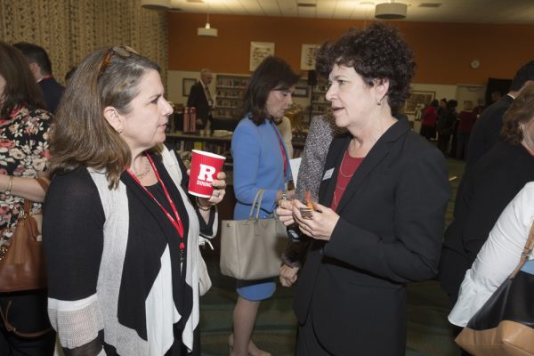Guests arrive and talk about the Lautenberg Papers exhibit opening reception