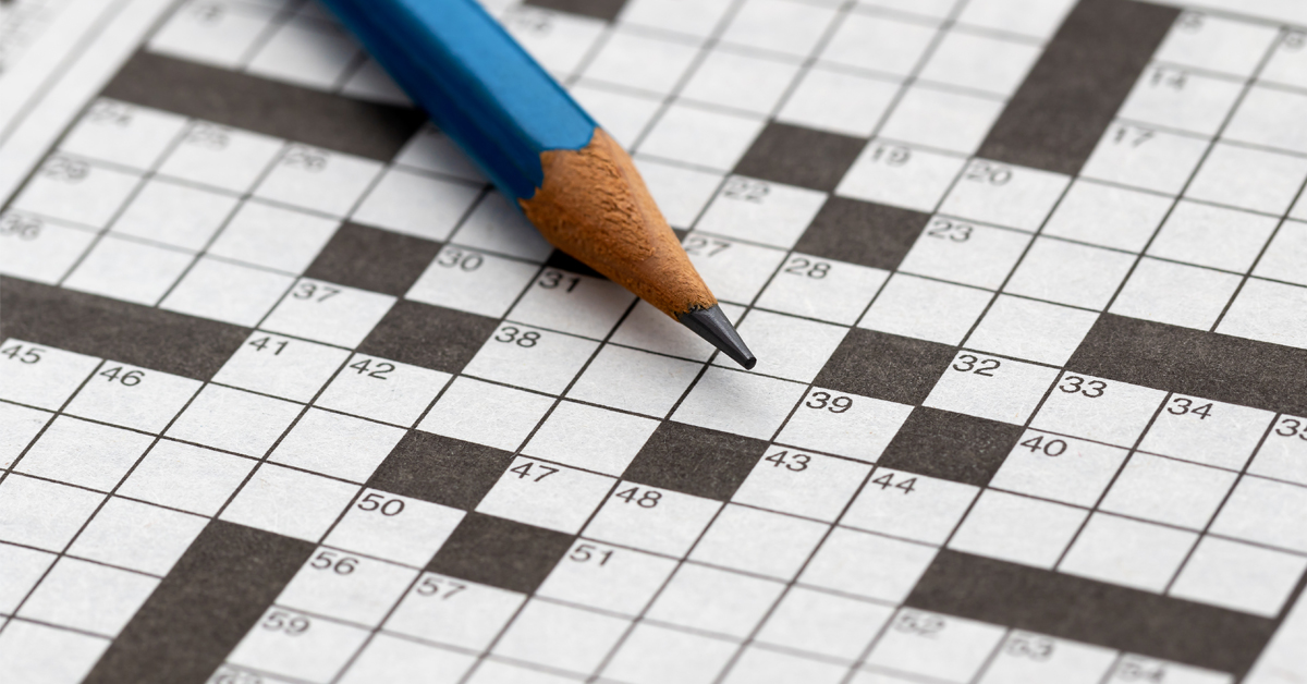 crossword puzzle and pencil