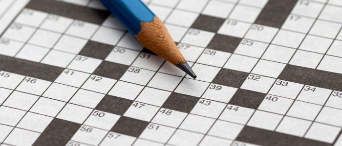 Crossword 1920x1080 Pencil lying on a blank crossword puzzle